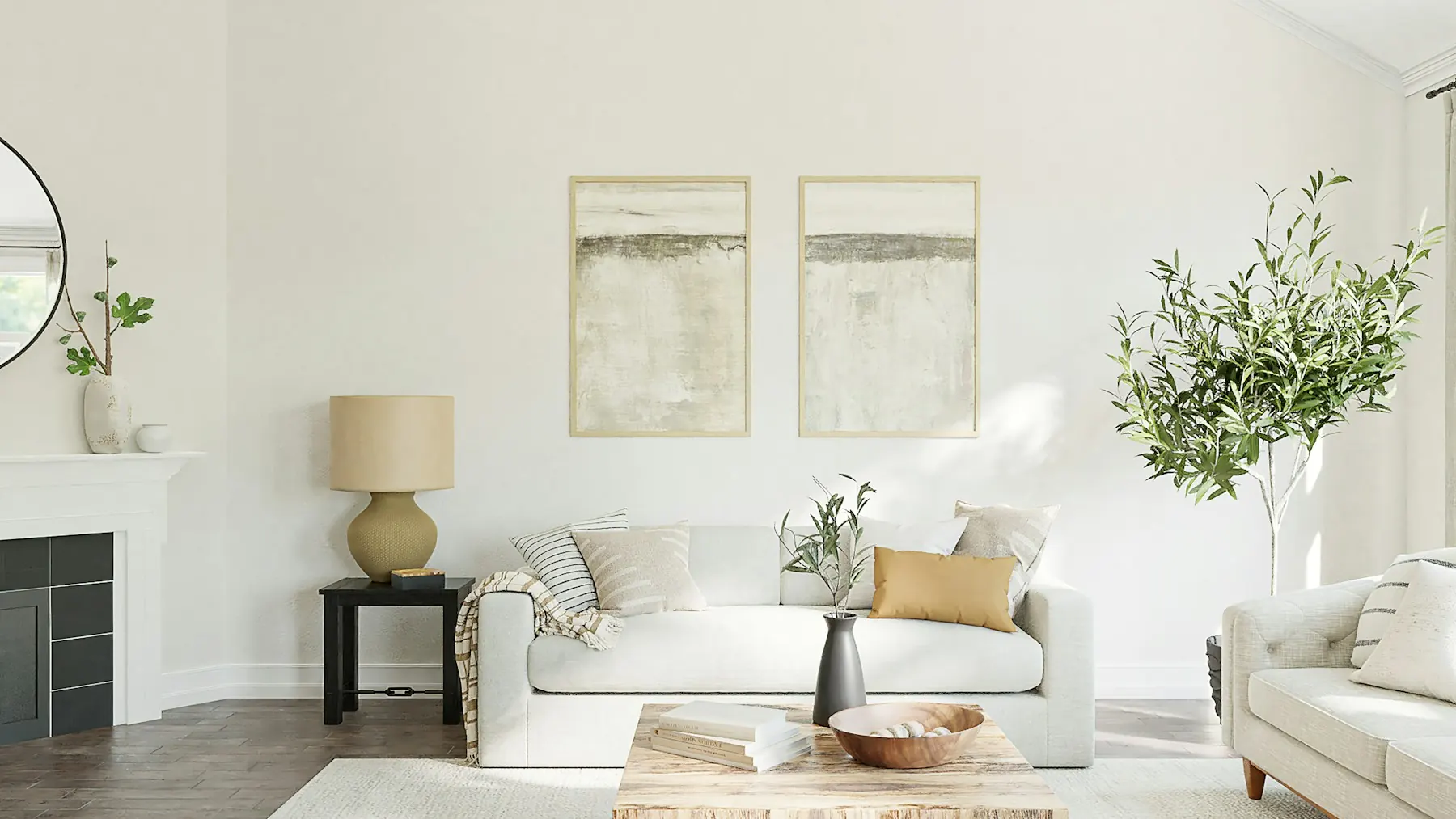 Living con sillón blanco, mesa de madera y cuadros claros
